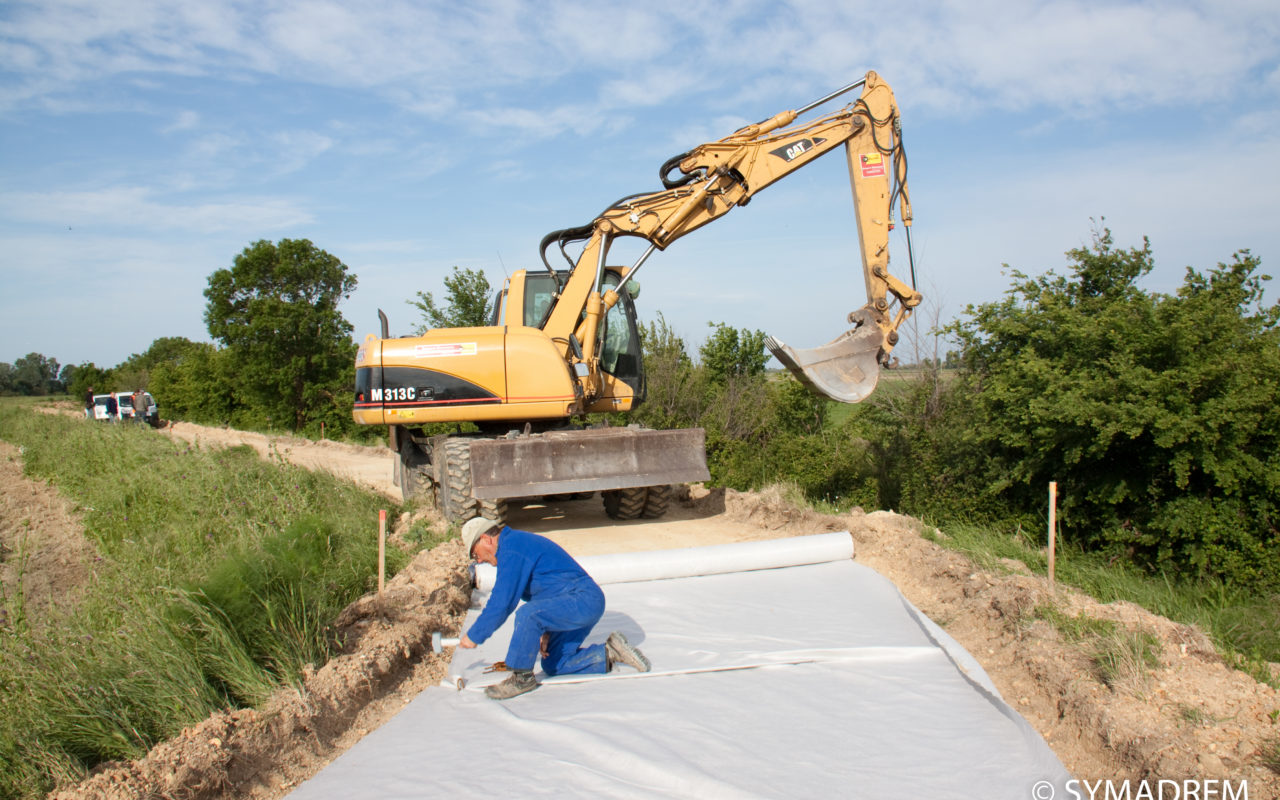 Pose d'un geotextile anti-contaminant